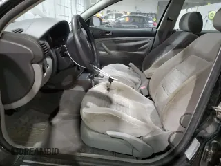 2003 Volkswagen Passat GLS z VIN WVWPD63B33P244885, wystawiony jako Copart lot #41471955 z przebiegiem 147 198 mil mil oraz Szkoda całkowita • Salvage title. Historia ofert i sprzedaży dostępna na DreamBid. Obrazek 7.