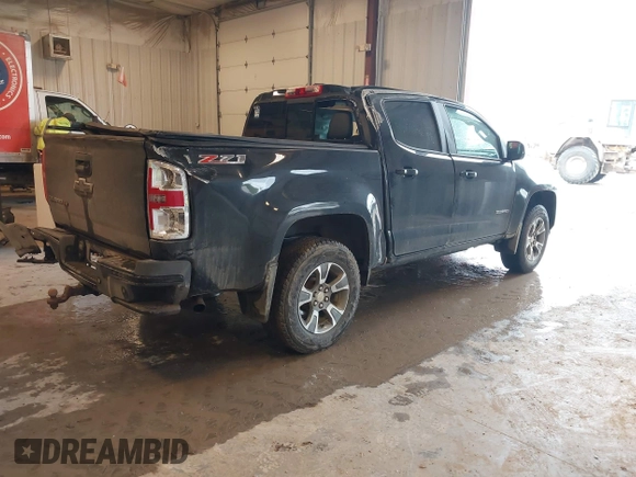 2019 Chevrolet Colorado 4WD Z71 with VIN 1GCGTDEN2K1121689, listed as a IAAI auction lot 42201118 with 96,351 mi miles and . Bid and sale history available at DreamBid. Image 4.