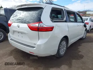 2016 Toyota Sienna XLE with VIN 5TDYK3DC8GS738204, listed as a IAAI auction lot 41105430 with 109,248 mi miles. Bid and sale history available at carsss.com. Image 4.