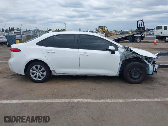 2023 Toyota Corolla LE with VIN 5YFB4MDE4PP055531, listed as a IAAI auction lot 42135999 with 41,631 mi miles and . Bid and sale history available at DreamBid. Image 14.
