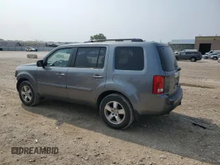2009 Honda Pilot EX-L with VIN 5FNYF48659B052918, listed as a Copart auction lot 64185004 with 151,021 mi miles and Salvage Title. Bid and sale history available at carsss.com. Image 2.