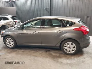 2012 Ford Focus SE with VIN 1FAHP3K22CL394088, listed as a IAAI auction lot 40953085 with 147,259 mi miles and . Bid and sale history available at carsss.com. Image 15.
