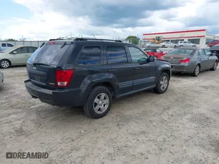 2005 Jeep Grand Cherokee Laredo with VIN 1J4GS48K65C570266, listed as a IAAI auction lot 42026624 with 162,512 mi miles. Bid and sale history available at carsss.com. Image 4.