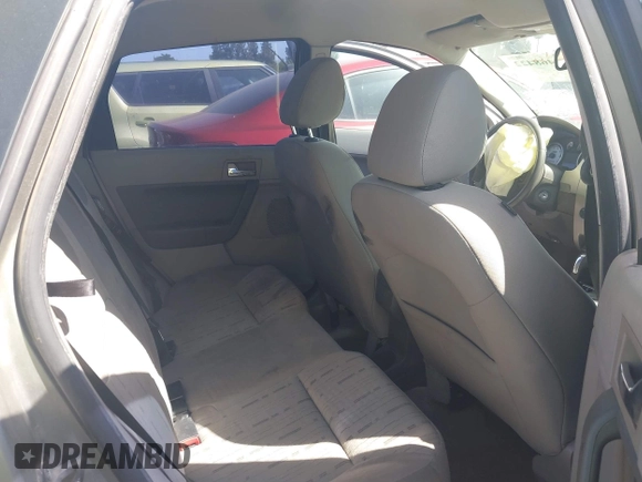 2008 Ford Focus SE with VIN 1FAHP35N88W242103, listed as a IAAI auction lot 39468422 with 169,911 mi miles. Bid and sale history available at carsss.com. Image 8.