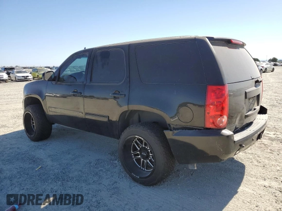 2013 GMC Yukon SLT with VIN 1GKS2CE03DR258564, listed as a Copart auction lot 61439774 with 147,284 mi miles and Salvage Title. Bid and sale history available at carsss.com. Image 2.