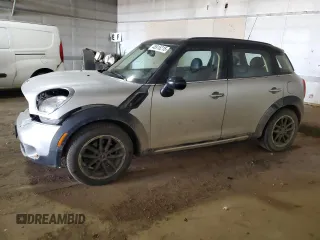 2016 MINI Countryman S with VIN WMWZC5C5XGWU03443, listed as a Copart auction lot 48915215 with 105,030 mi miles and Salvage Title. Bid and sale history available at DreamBid. Image 1.
