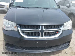 2012 Dodge Grand Caravan SE with VIN 2C4RDGBG2CR351999, listed as a IAAI auction lot 42075245 with 149,997 mi miles. Bid and sale history available at carsss.com. Image 6.