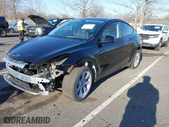 2023 Tesla Model Y Long Range with VIN 7SAYGAEE3PF925928, listed as a IAAI auction lot 41753910 with Not provided miles and . Bid and sale history available at DreamBid. Image 2.