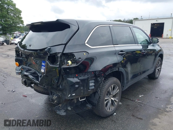 2018 Toyota Highlander LE with VIN 5TDZZRFH2JS246805, listed as a IAAI auction lot 42697587 with 287,457 mi miles and . Bid and sale history available at DreamBid. Image 4.