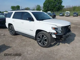 2018 Chevrolet Tahoe Premier with VIN 1GNSKCKJ1JR245470, listed as a IAAI auction lot 42667121 with 174,067 mi miles and . Bid and sale history available at DreamBid. Image 1.
