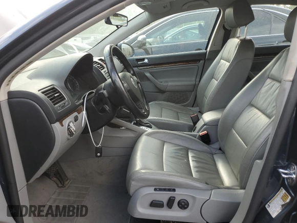2005 Volkswagen Jetta 2.5L with VIN 3VWDG71K65M606300, listed as a Copart auction lot 57848515 with 108,928 mi miles and Salvage title. Bid and sale history available at DreamBid. Image 7.