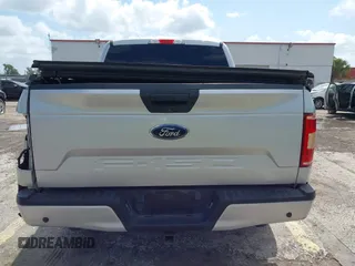 2019 Ford F-150 XL with VIN 1FTEW1E55KKC58276, listed as a IAAI auction lot 42133235 with 97,032 mi miles. Bid and sale history available at carsss.com. Image 16.