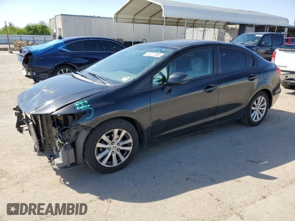 2012 Honda Civic EX with VIN 2HGFB2F84CH605329, listed as a Copart auction lot 52017085 with 102,362 mi miles and Salvage Title. Bid and sale history available at DreamBid. Image 1.