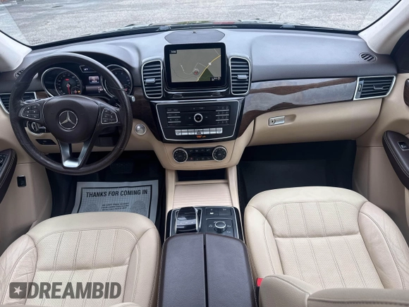 2016 Mercedes-Benz GLE 350 with VIN 4JGDA5HB2GA751053, listed as a IAAI auction lot 42632182 with 158,790 mi miles and . Bid and sale history available at DreamBid. Image 6.