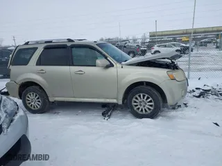 2010 Mercury Mariner Premier with VIN 4M2CN8H72AKJ05699, listed as a IAAI auction lot 41631468 with 205,563 mi miles. Bid and sale history available at carsss.com. Image 13.