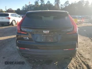 2021 Cadillac XT4 FWD Luxury с VIN 1GYAZAR4XMF066381, выставлен на аукционе Copart как лот 84615464 с пробегом 80 018 миль миль и Списание • Salvage title. История ставок и продаж доступна на DreamBid. Изображение 6.
