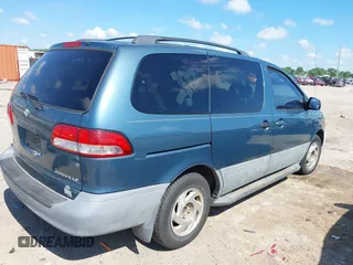 2002 Toyota Sienna LE with VIN 4T3ZF13C82U429841, listed as a IAAI auction lot 42131029 with 271,573 mi miles and . Bid and sale history available at DreamBid. Image 4.