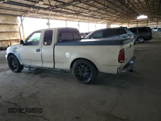 1999 Ford F-150 with VIN 1FTZX172XXKA26359, listed as a Copart auction lot 52215805 with 268,403 mi miles and Salvage title. Bid and sale history available at DreamBid. Image 2.