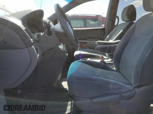 2010 Toyota Sienna with VIN 5TDZK4CC2AS303424, listed as a Copart auction lot 52880635 with 247,596 mi miles and Salvage Title. Bid and sale history available at DreamBid. Image 7.