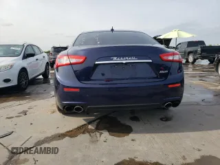 2015 Maserati Ghibli with VIN ZAM57XSA6F1146076, listed as a Copart auction lot 52474303 with 82,575 mi miles. Bid and sale history available at carsss.com. Image 6.