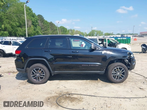 2017 Jeep Grand Cherokee Trailhawk with VIN 1C4RJFLG4HC940652, listed as a IAAI auction lot 42135489 with 102,593 mi miles and . Bid and sale history available at DreamBid. Image 14.
