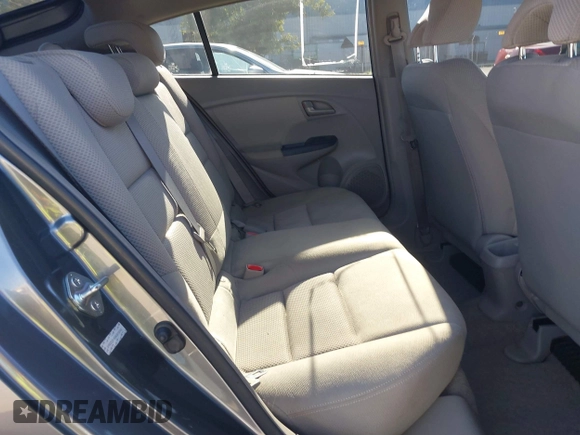 2010 Honda Insight LX with VIN JHMZE2H50AS019740, listed as a IAAI auction lot 41665527 with 74,022 mi miles and . Bid and sale history available at DreamBid. Image 8.