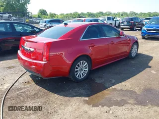 2011 Cadillac CTS Luxury with VIN 1G6DG5EY9B0146136, listed as a IAAI auction lot 42463083 with 182,324 mi miles and . Bid and sale history available at DreamBid. Image 4.