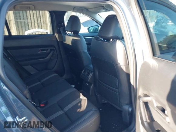 2024 Mazda CX-50 S Select with VIN 7MMVABAM5RN243593, listed as a IAAI auction lot 41313260 with 3,695 mi miles and . Bid and sale history available at DreamBid. Image 8.