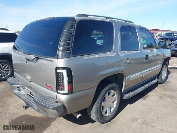 2003 GMC Yukon SLT with VIN 1GKEK13Z83J333386, listed as a IAAI auction lot 41425453 with 118,889 mi miles. Bid and sale history available at carsss.com. Image 4.