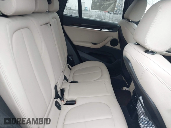 2018 BMW X1 xDrive28i with VIN WBXHT3C32J5L33213, listed as a IAAI auction lot 42513235 with 75,918 mi miles and . Bid and sale history available at DreamBid. Image 8.
