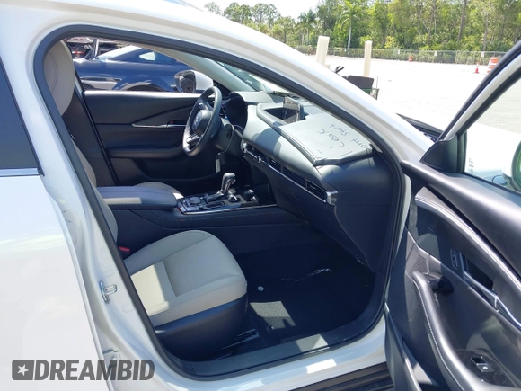 2024 Mazda CX-30 S Carbon Edition with VIN 3MVDMBCM2RM719131, listed as a IAAI auction lot 42265739 with 8,470 mi miles and . Bid and sale history available at DreamBid. Image 5.