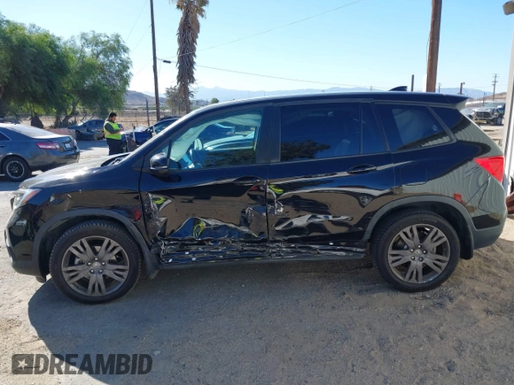 2019 Honda Passport EX-L with VIN 5FNYF7H58KB005624, listed as a IAAI auction lot 41344058 with 63,867 mi miles and . Bid and sale history available at carsss.com. Image 14.