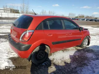 2009 Kia Rio LX with VIN KNADE243596567394, listed as a Copart auction lot 42240065 with 160,044 mi miles and Salvage Title. Bid and sale history available at carsss.com. Image 3.