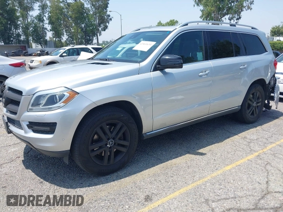 2014 Mercedes-Benz GL 450 z VIN 4JGDF7CE9EA411572, wystawiony jako IAAI lot #42461631 z przebiegiem 121 885 mil mil oraz . Historia ofert i sprzedaży dostępna na DreamBid. Obrazek 17.