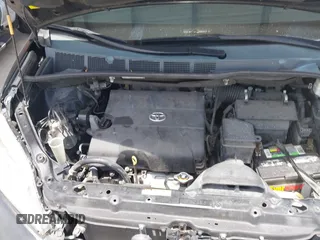 2014 Toyota Sienna XLE z VIN 5TDYK3DC2ES423847, wystawiony jako IAAI lot #40001988 z przebiegiem 130 731 mil mil oraz . Historia ofert i sprzedaży dostępna na DreamBid. Obrazek 10.