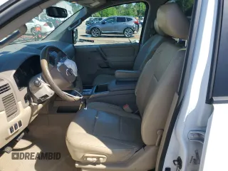 2012 Nissan Titan SV with VIN 1N6BA0ED9CN302103, listed as a Copart auction lot 52678495 with 214,564 mi miles and Salvage title. Bid and sale history available at DreamBid. Image 7.