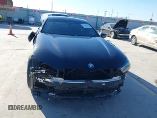 2023 BMW 8 Series 840i with VIN WBAGV4C08PCL51151, listed as a IAAI auction lot 41744313 with 30,457 mi miles. Bid and sale history available at carsss.com. Image 13.