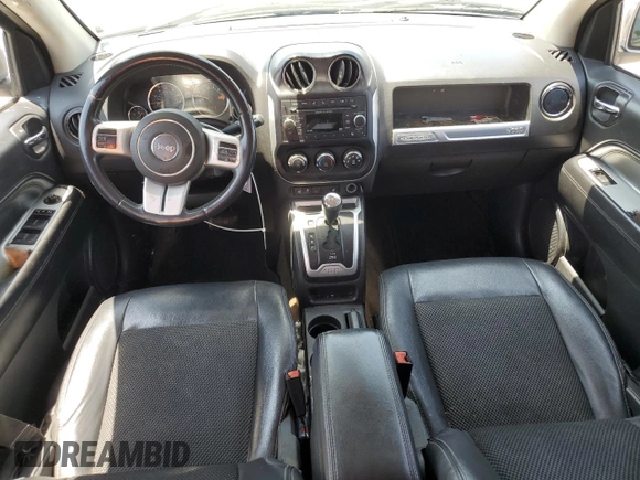 2016 Jeep Compass Latitude z VIN 1C4NJCEA8GD692985, wystawiony jako Copart lot #61872985 z przebiegiem 191 871 mil mil oraz Szkoda całkowita • Salvage title. Historia ofert i sprzedaży dostępna na DreamBid. Obrazek 8.
