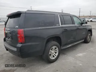 2019 Chevrolet Suburban LT z VIN 1GNSCHKCXKR143548, wystawiony jako Copart lot #54251715 z przebiegiem 102 804 mil mil oraz Szkoda całkowita • Salvage title. Historia ofert i sprzedaży dostępna na DreamBid. Obrazek 3.