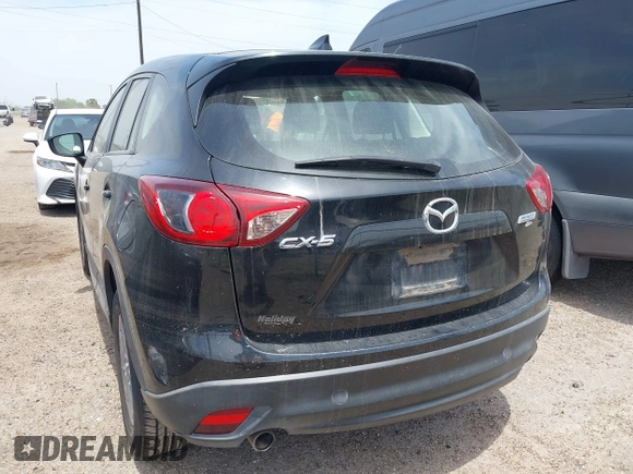 2016 Mazda CX-5 Sport with VIN JM3KE2BY8G0847018, listed as a IAAI auction lot 42064726 with 69,017 mi miles and . Bid and sale history available at DreamBid. Image 3.