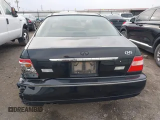 1999 Infiniti Q45 z VIN JNKBY31A3XM602466, wystawiony jako IAAI lot #41721377 z przebiegiem 113 158 mil mil oraz . Historia ofert i sprzedaży dostępna na DreamBid. Obrazek 16.