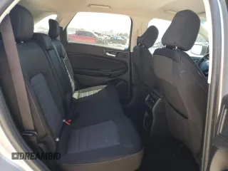 2020 Ford Edge SE z VIN 2FMPK3G91LBA11070, wystawiony jako Copart lot #51683775 z przebiegiem 72 511 mil mil oraz Czysty tytuł • Clean title. Historia ofert i sprzedaży dostępna na DreamBid. Obrazek 11.