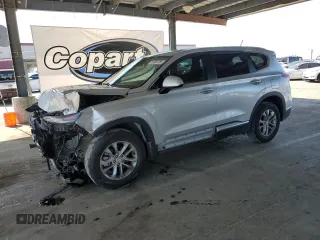 2019 Hyundai Santa Fe SE with VIN 5NMS23AD4KH043877, listed as a Copart auction lot 53997085 with 64,018 mi miles and Salvage Title. Bid and sale history available at carsss.com. Image 1.