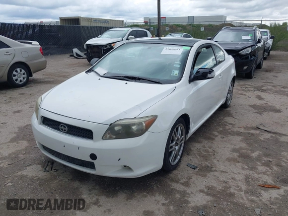 2005 Scion tC with VIN JTKDE177750015400, listed as a IAAI auction lot 39040511 with 232,749 mi miles. Bid and sale history available at carsss.com. Image 18.