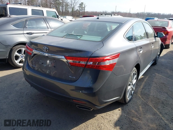 2015 Toyota Avalon Limited with VIN 4T1BK1EB5FU157586, listed as a IAAI auction lot 41827250 with 62,572 mi miles and . Bid and sale history available at carsss.com. Image 4.