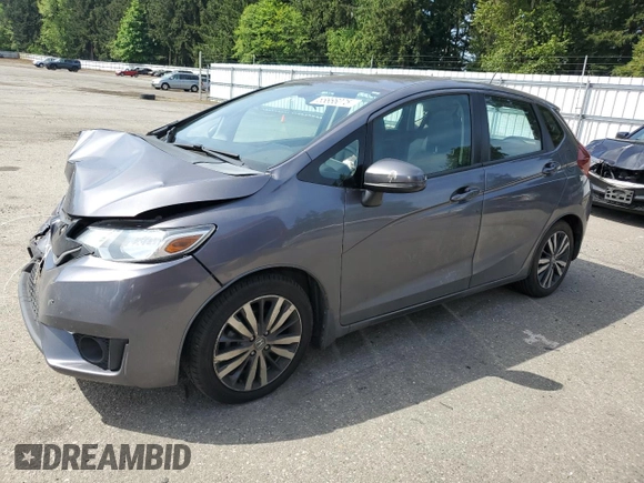 2015 Honda Fit EX-L with VIN 3HGGK5H80FM767970, listed as a Copart auction lot 55866075 with 64,435 mi miles and Salvage Title. Bid and sale history available at DreamBid. Image 1.