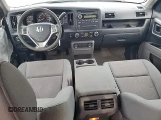 2012 Honda Ridgeline RTS with VIN 5FPYK1F46CB460256, listed as a Copart auction lot 70879644 with 136,217 mi miles and Salvage Title. Bid and sale history available at carsss.com. Image 8.