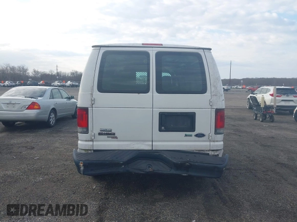 2013 Ford Econoline Cargo Commercial with VIN 1FTNE1EW4DDA09857, listed as a IAAI auction lot 41889302 with 131,059 mi miles and . Bid and sale history available at DreamBid. Image 16.