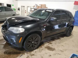 2012 BMW X5 35i z VIN 5UXZV4C53CL749562, wystawiony jako Copart lot #58309705 z przebiegiem 270 093 mil mil oraz Czysty tytuł • Clean title. Historia ofert i sprzedaży dostępna na DreamBid. Obrazek 1.