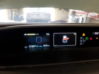 2022 Toyota Prius LE with VIN JTDL9MFU3N3034315, listed as a Copart auction lot 57041045 with 77,307 mi miles and Salvage title. Bid and sale history available at DreamBid. Image 9.